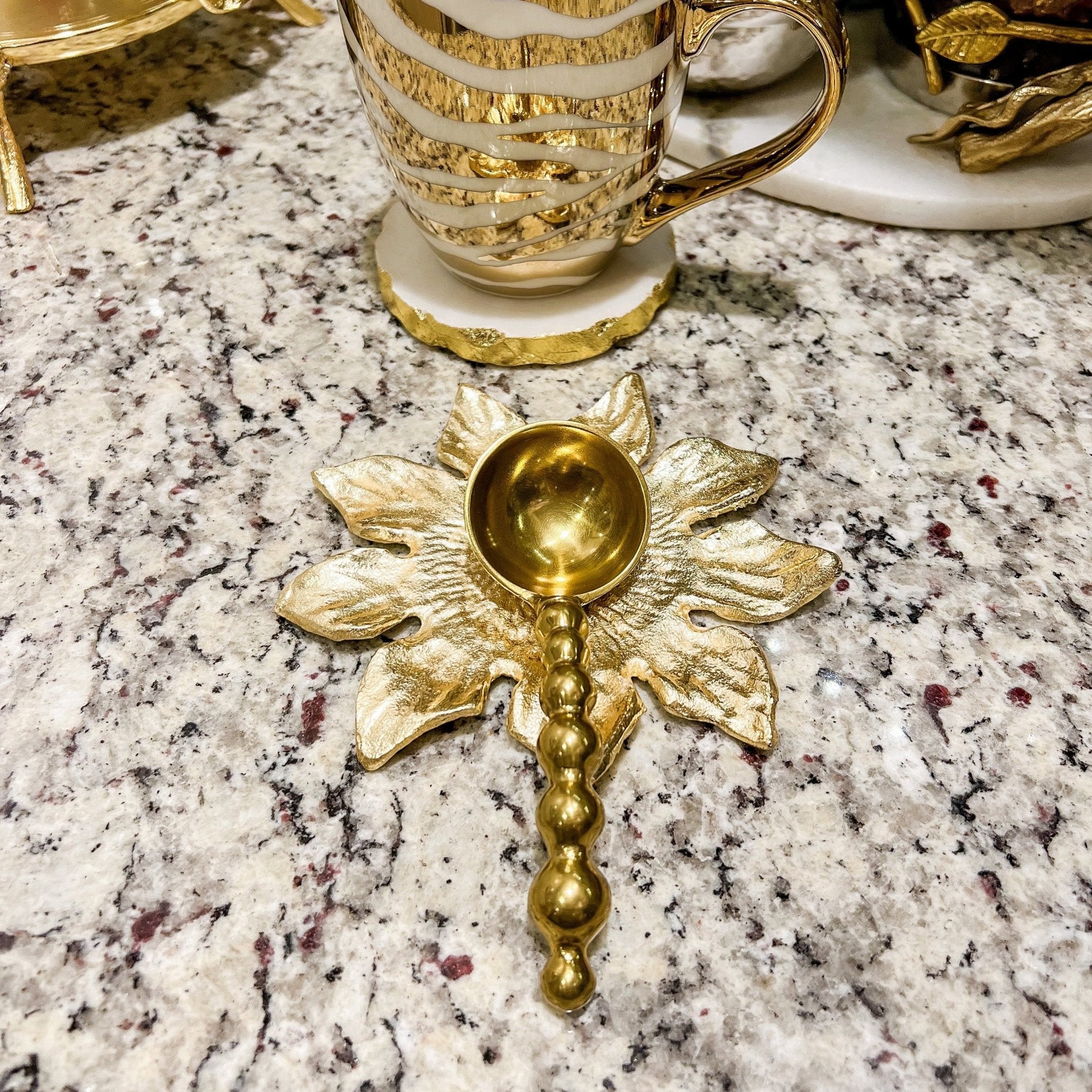 https://shopdiamondvale.com/cdn/shop/products/gold-gilded-beaded-coffee-spoon-498898_2048x.jpg?v=1661827095